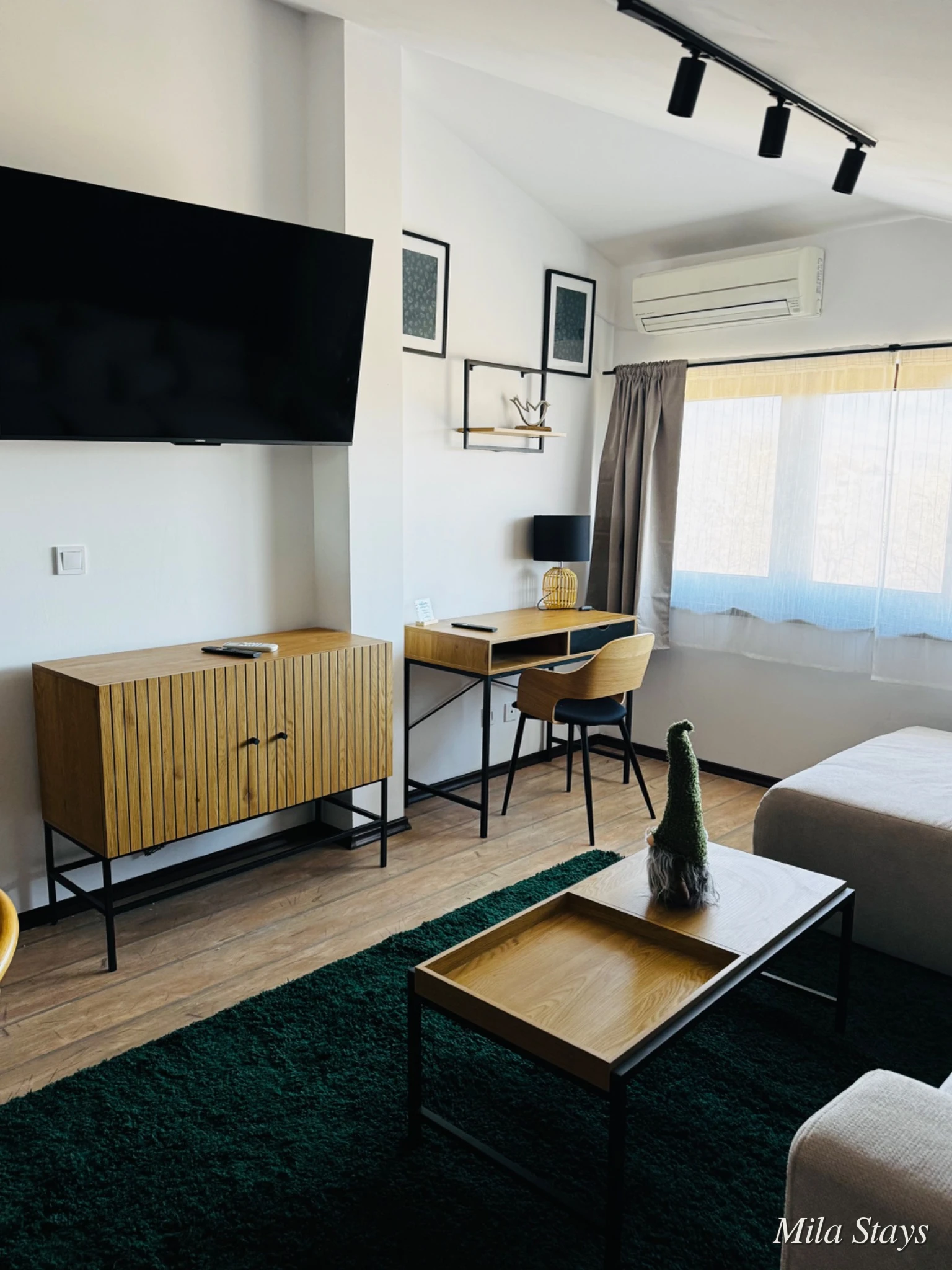 Mila Stays holiday apartment interior with a practical workspace